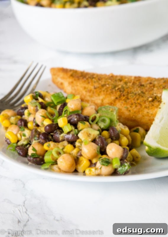 Fiesta Chickpea Salad 3 A serving of Southwestern Chickpea Salad on a plate, showcasing its vibrant ingredients.