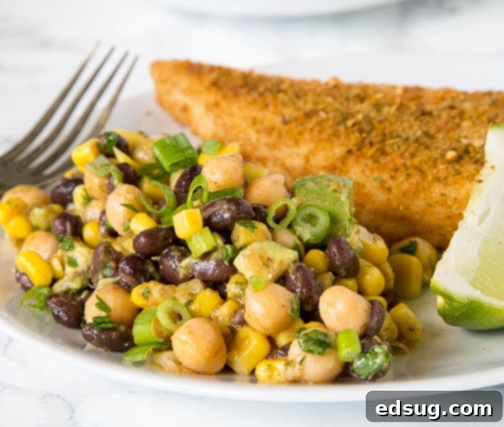 Fiesta Chickpea Salad 4 Southwestern Chickpea Salad - chickpeas and black beans with corn and avocado in a Southwestern style dressing. A great healthy and fresh summer side dish.