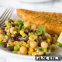 Southwestern Chickpea Salad - chickpeas and black beans with corn and avocado in a Southwestern style dressing. A great healthy and fresh summer side dish. 