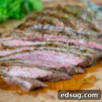 Grilled Chile Lime Flank Steak - flank steak that is marinated in olive oil, lime juice, cilantro, and jalapeno. Then grilled in just minutes for a super fast meal the whole family will love. 