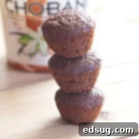 A delicious Double Chocolate Chobani Muffin, rich in color and inviting in texture, representing the perfect blend of indulgence and a healthier twist.