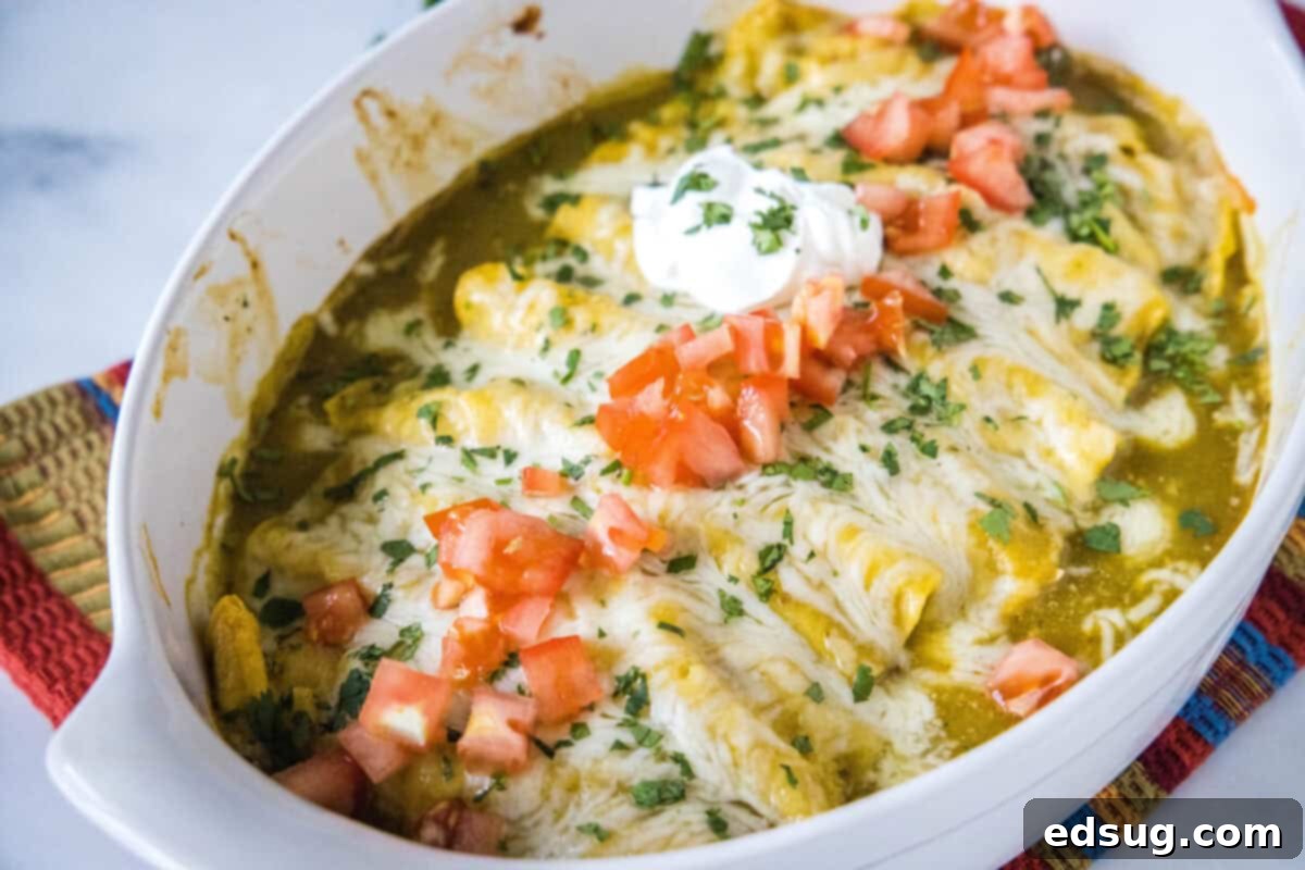 Zesty Green Chile Chicken Enchiladas 9 These Green Chile Chicken Enchiladas are creamy, cheesy, and packed with flavor! Made with seasoned shredded chicken, melty cheese, and topped with green chile enchilada sauce.