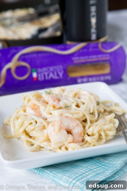 Shrimp Fettuccine Alfredo, cooked in a single pan, offering a delightful meal for any night of the week, from busy weeknights to romantic date nights.