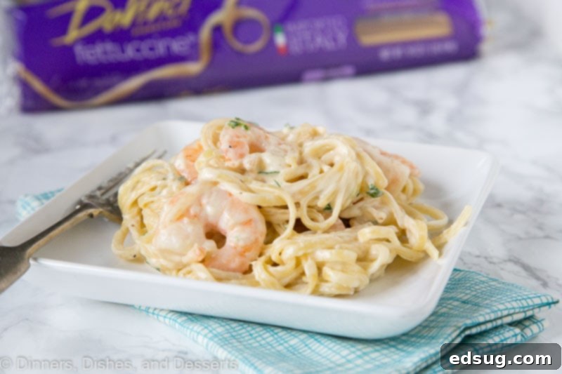 The finished One-Pan Fettuccine Alfredo with shrimp, a perfect simple and romantic meal for any night of the week.
