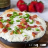 Baked Blue Cheese Dip - a creamy cheese dip recipe with bacon and lots of blue cheese. Warm, gooey, and great for parties! 