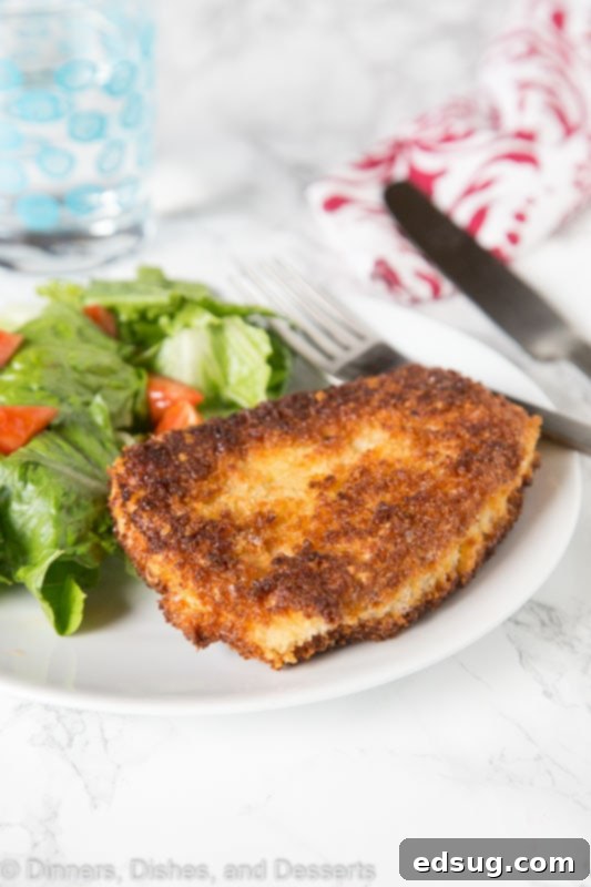 Crunchy Pork Cutlet Perfection 3 Crispy Pork Cutlet - tender boneless pork chops breaded and pan fried to crispy perfection. Served with a salad for a delicious meal any night of the week.