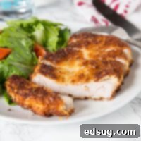Crunchy Pork Cutlet Perfection 5 Crispy Pork Cutlet - tender boneless pork chops breaded and pan fried to crispy perfection. Served with a salad for a delicious meal any night of the week.
