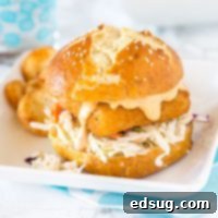 Spicy Fish Sandwich Sensation 6 Spicy Fish Sandwich - Crispy fish sandwich with creamy coleslaw and a spicy tarter sauce. Easy dinner recipe for night of the week.