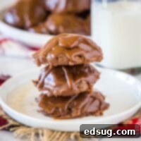cropped in picture of sheet cake cookies stacked on a white plate