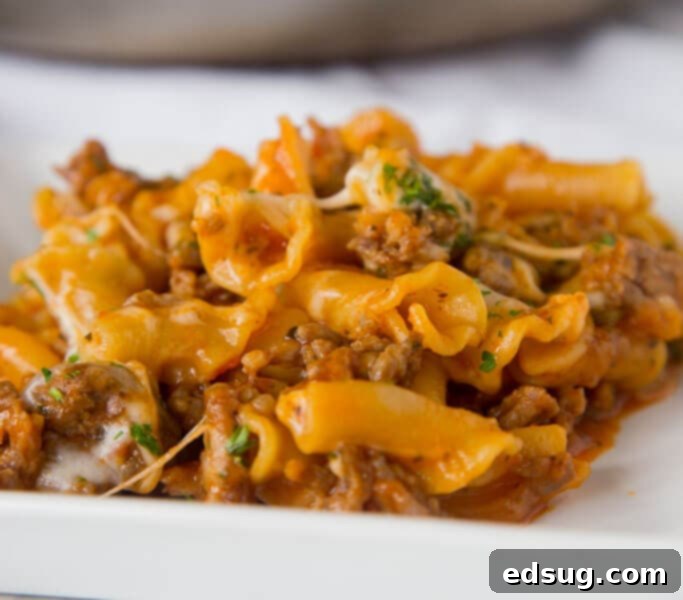 Homemade Hamburger Helper Lasagna, a family-friendly dish, served in a skillet.