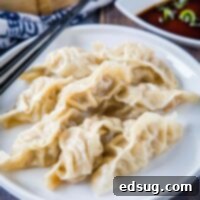 square image of steamed pork dumplings
