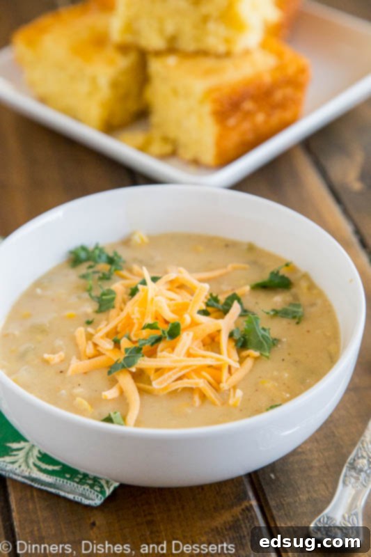 Southwestern Chicken Corn Chowder simmering in a pot, showcasing its rich, creamy texture and vibrant ingredients.