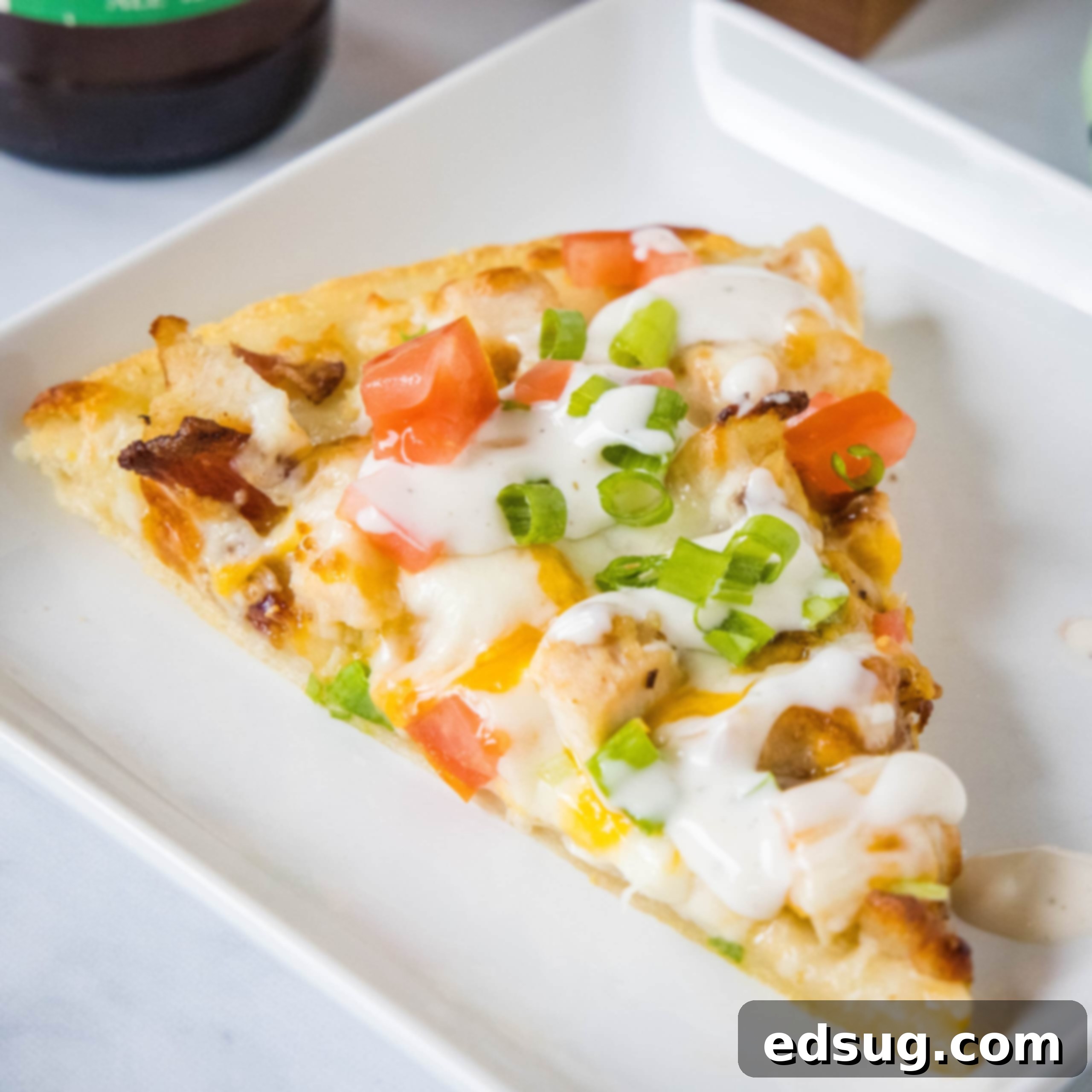 Cluck-Worthy Chicken Meals 6 close up chicken bacon pizza on a plate