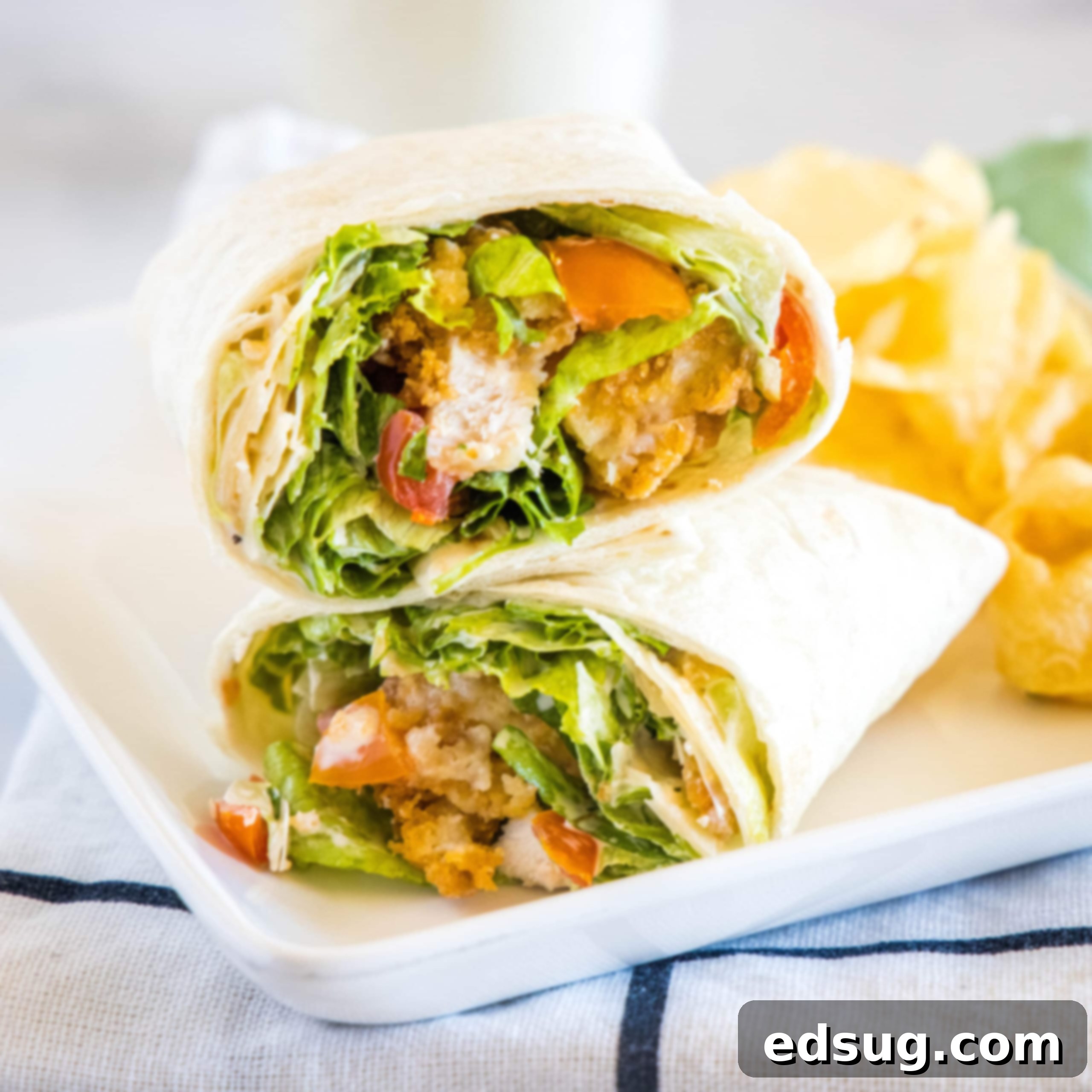 Cluck-Worthy Chicken Meals 53 cropped in close up of chicken caesar wrap