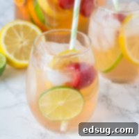 White Sangria Recipe - An easy white wine sangria that is crisp, refreshing, and delicious. Great for entertaining or just because! 
