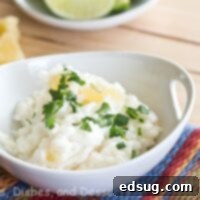 Vibrant Caribbean Rice 1 A beautifully presented bowl of Caribbean Rice, garnished with fresh herbs and a hint of lime, ready to be served.