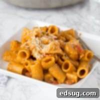 Vibrant Bruschetta Chicken Pasta 2 Bruschetta Chicken Pasta - an easy chicken pasta loaded with lots of tomatoes, seasoned chicken, and topped with Parmesan cheese. Easy to make and ready quickly for any night of the week.