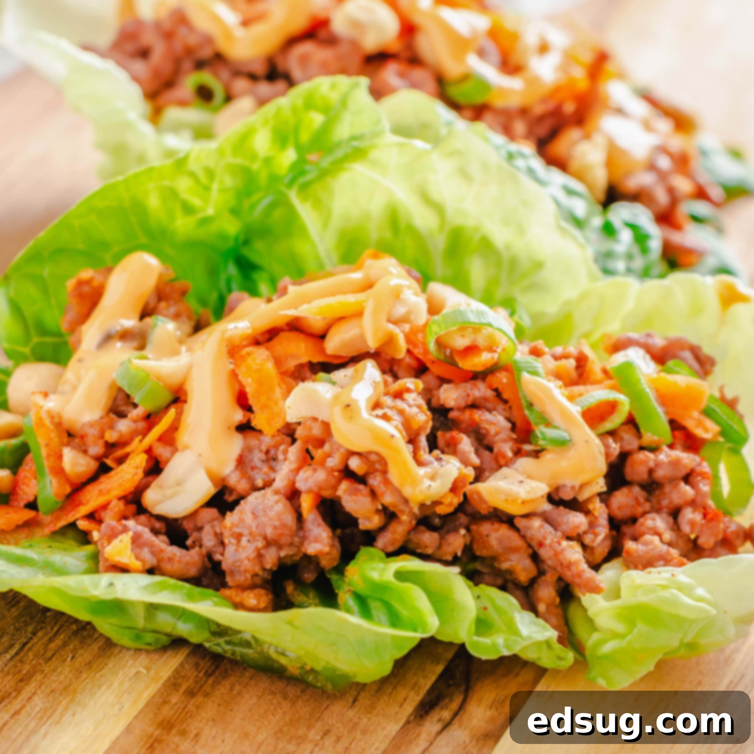 close up of lettuce wrap on a cutting board