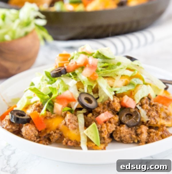 Pierogies Taco Skillet - Cheese filled pierogies get a Mexican twist with taco meat, salsa, and plenty of cheese! Great weeknight meal that is ready in no time. 