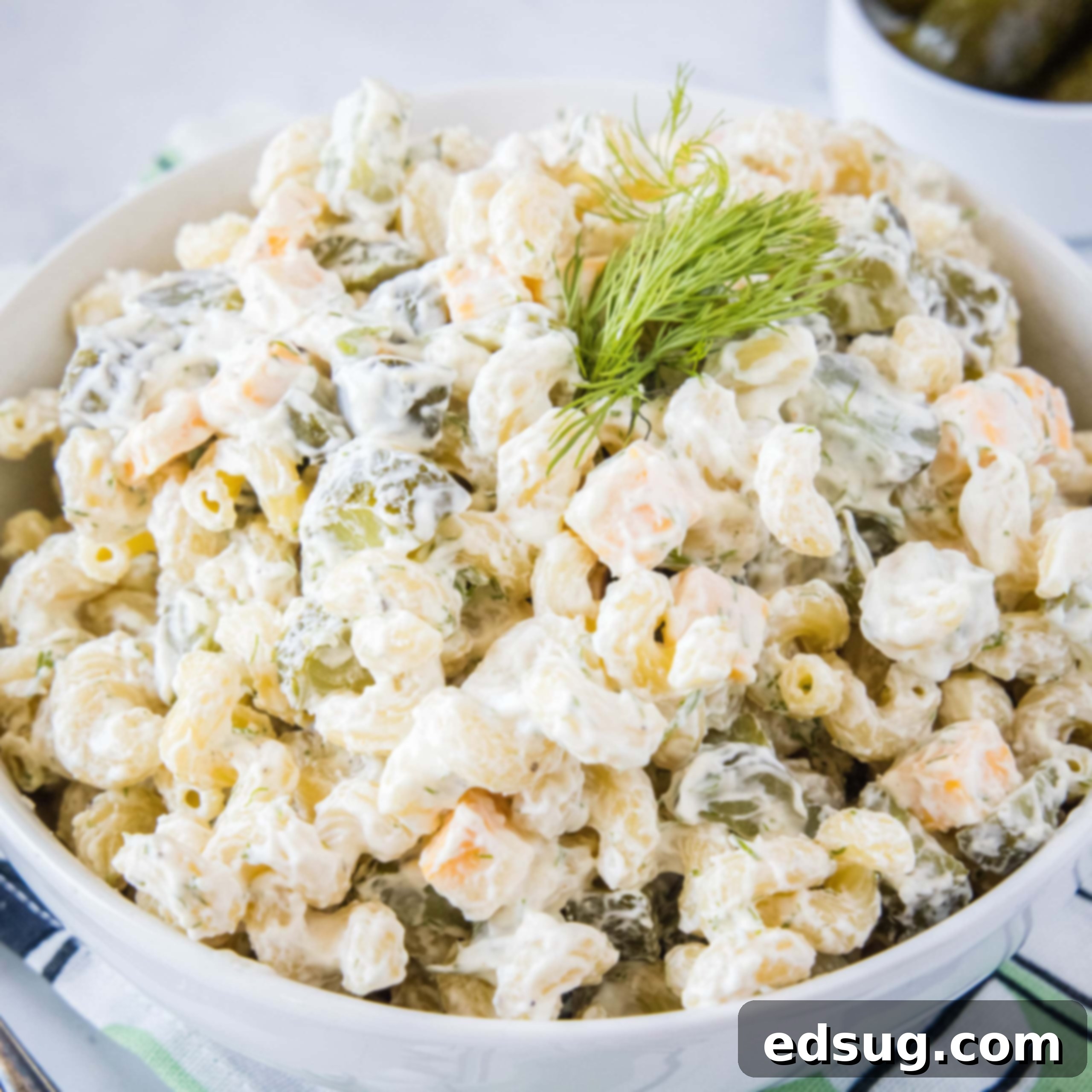 cropped square image of dill pickle pasta salad