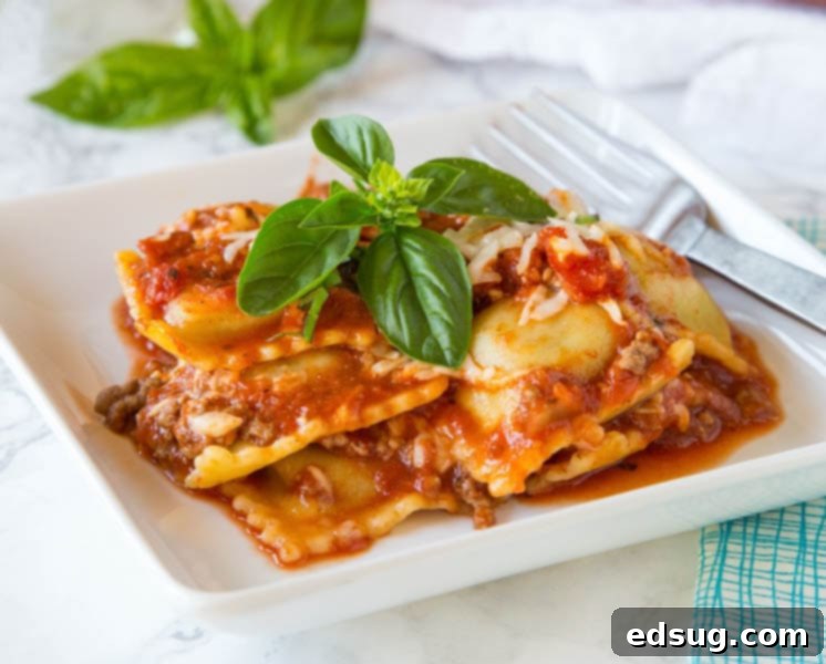 baked ravioli with basil on a plate