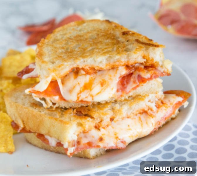 Pepperoni Pizza Grilled Cheese Sandwich - Take your favorite grilled cheese sandwich up a notch and make it taste like pepperoni pizza!