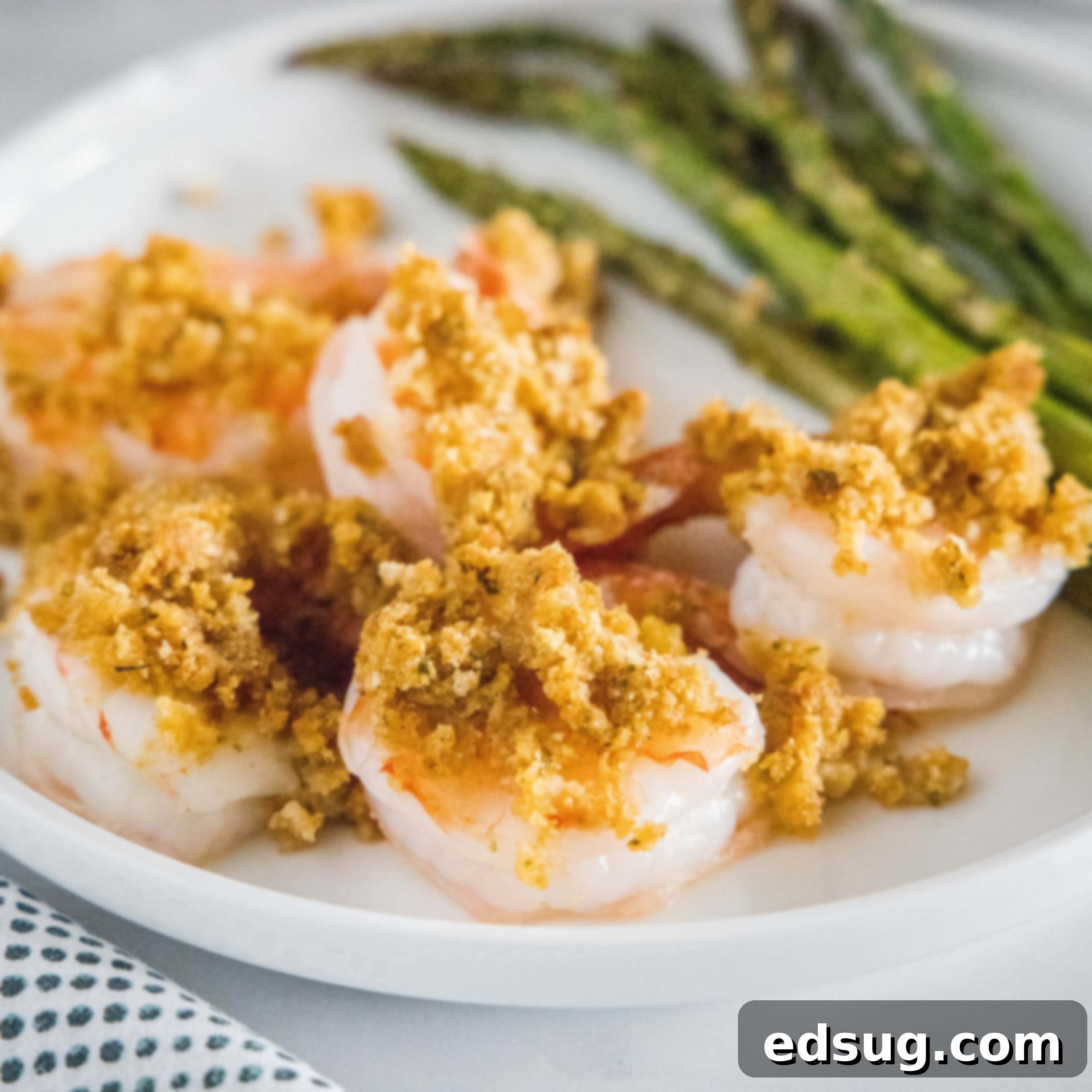 Close up of crispy baked shrimp, golden and perfectly cooked.