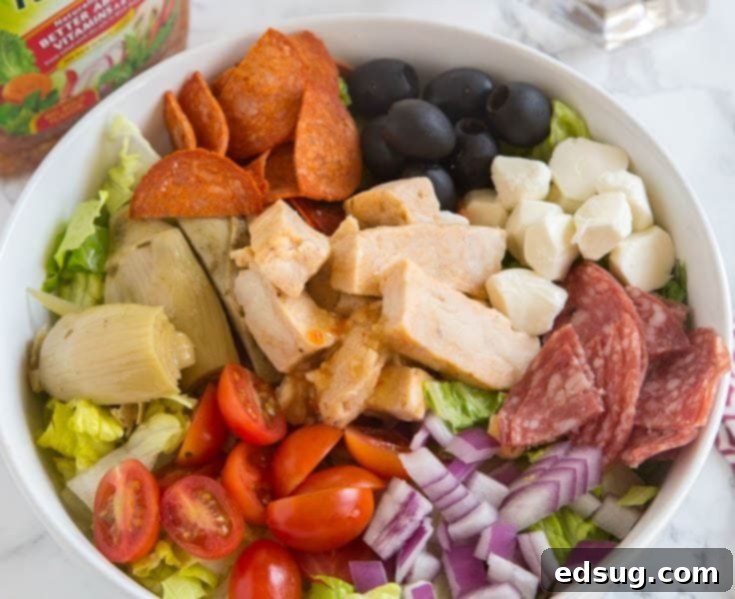 Colorful Grilled Chicken Antipasto Salad with fresh ingredients