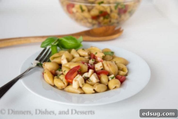 Fresh Caprese Pasta Salad with cherry tomatoes and mozzarella
