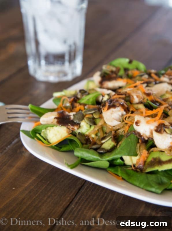 Hearty Spinach Chicken Salad with caramelized onions and avocado