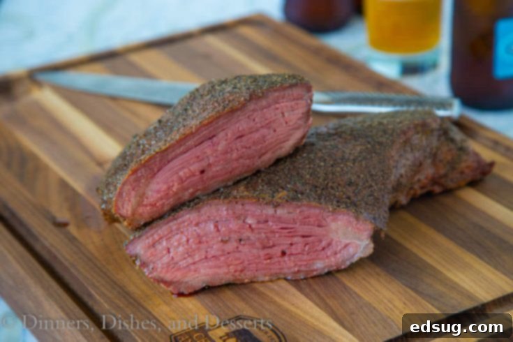 Perfectly cooked Smoked Tri-Tip, sliced to show its juicy interior