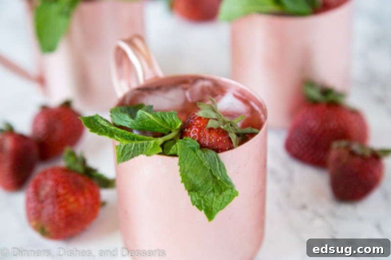 Refreshing Strawberry Moscow Mule 3 Strawberry Moscow Mule - strawberries giving a classic Moscow Mule a sweet and fun twist!  Whip these up today, they are perfect to sip on any day of the week!