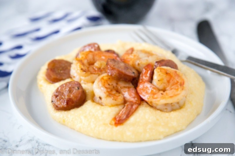 Simple Shrimp and Grits 3 A delicious plate of Shrimp and Grits, featuring cheesy corn grits and seasoned shrimp.