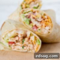 Crunchy Southwestern Chicken Wrap - easy lunch ideas are hard to come by. These chicken wraps come together in minutes, you can make them ahead, and the creamy spicy sauce makes them extra tasty!