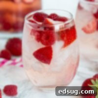Blushing Berry Rose Sangria 5 Berry Rosé Sangria - Use Rose wine to make this refreshing and easy sangria for summer. Loaded with raspberry and strawberries for a great summer cocktail.