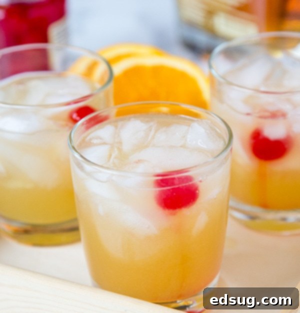 A vibrant, refreshing Whiskey Sour cocktail, perfectly balanced between sweet and tangy, garnished with a bright red maraschino cherry, set against a warm, inviting backdrop.