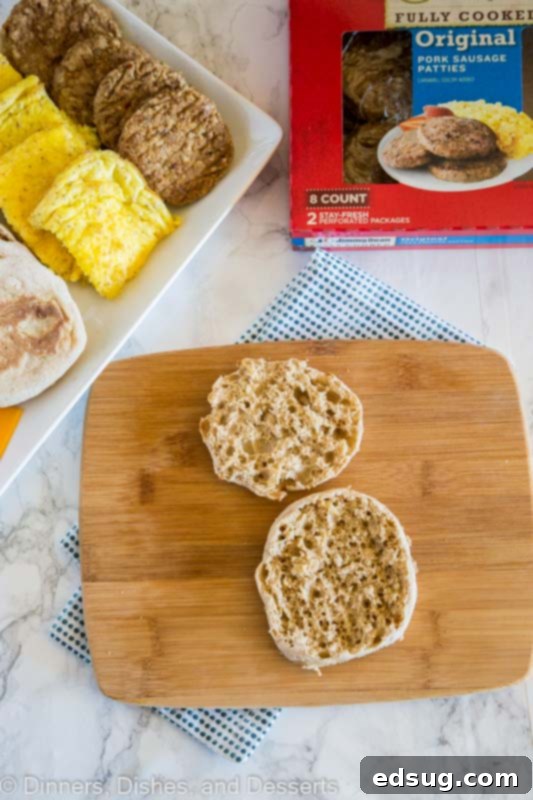 Food on a wooden table, with Sandwich and Sausage