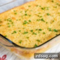 Delicious Jiffy Corn Casserole in a baking pan, golden brown and perfectly baked.