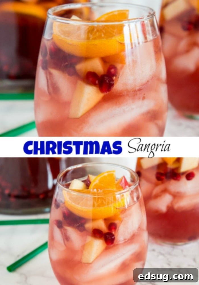 Festive Christmas Sangria 5 A festive close-up of a glass of Christmas Sangria, garnished with fresh fruits, evoking the warmth and cheer of the holiday season.