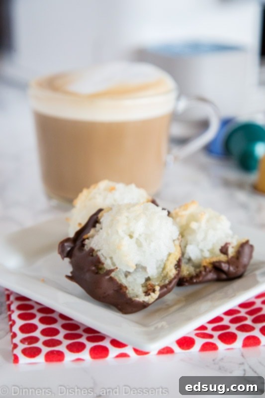 Coconut Macaroons on a plate with a cup of coffee