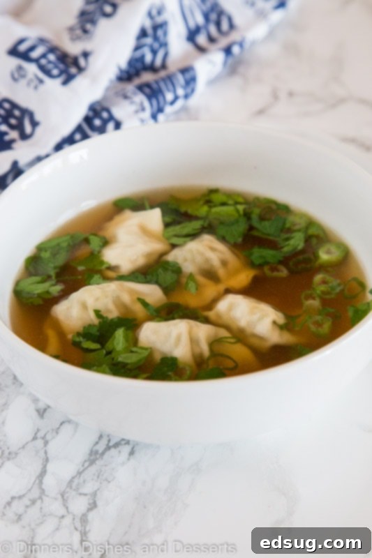 Homemade Wonton Soup 3 A bowl of soup, with Wonton and Pork