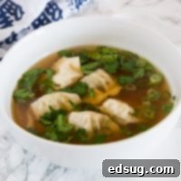 Homemade Wonton Soup 5 A bowl of soup, with Wonton