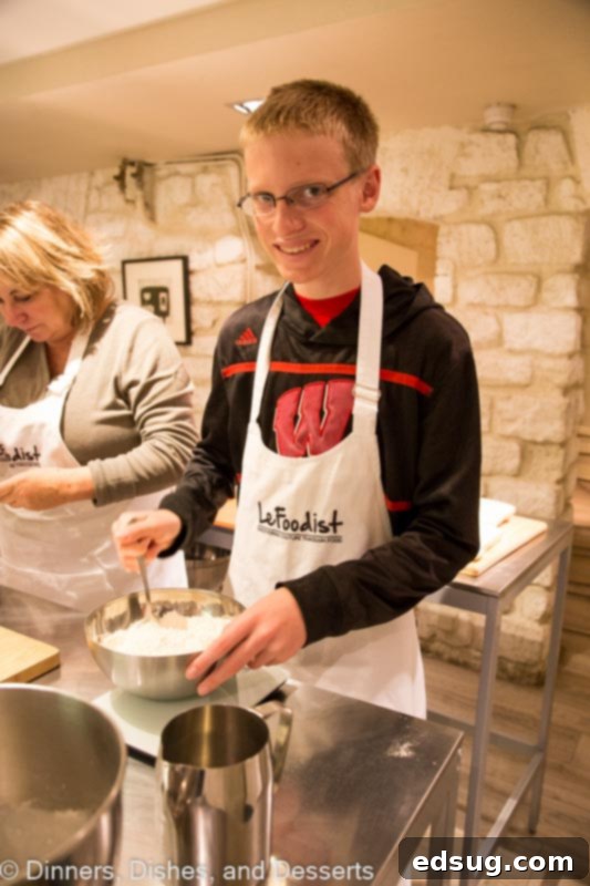 Buttery Homemade Croissants 4 A man and woman preparing food in a kitchen, with Croissant and Dinner