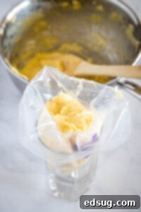 Sweet Homemade Churro Delights 14 filling piping bag with batter