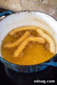 Sweet Homemade Churro Delights 17 frying churros in oil