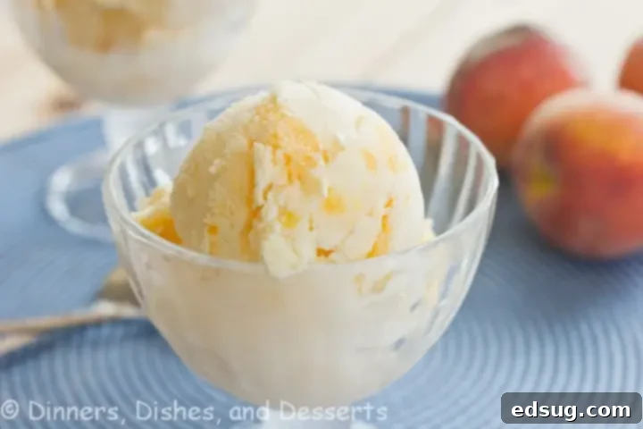 Vanilla Peach Swirl Frozen Yogurt in a cup, ready to be pinned