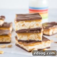 Homemade Snickers Bars - These are a chocolate caramel nougat layered bar that is pretty much like the store bought candy.
