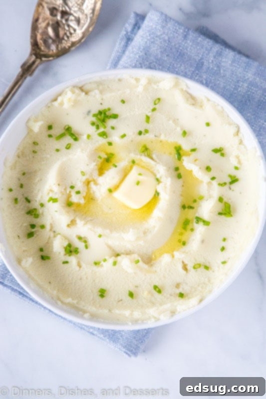 Creamy Instant Pot Mashed Potatoes 4 A plate of mashed potatoes with butter