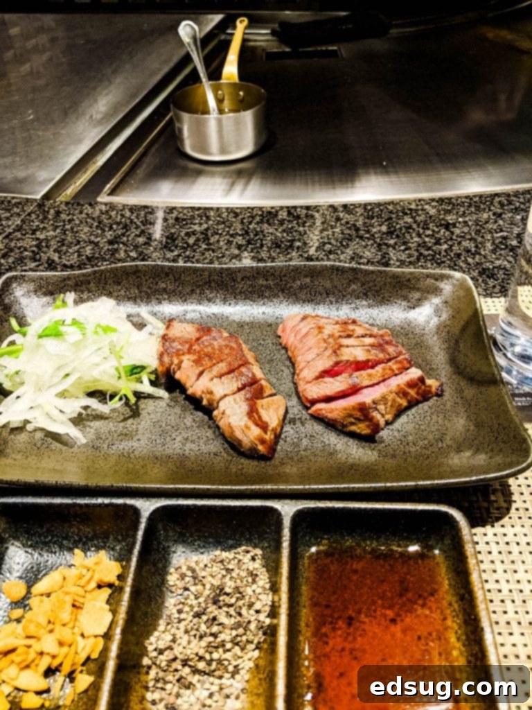 Japan's Legendary Wagyu 6 Chef preparing premium A5 Wagyu beef on the teppanyaki grill at Ginza Steak