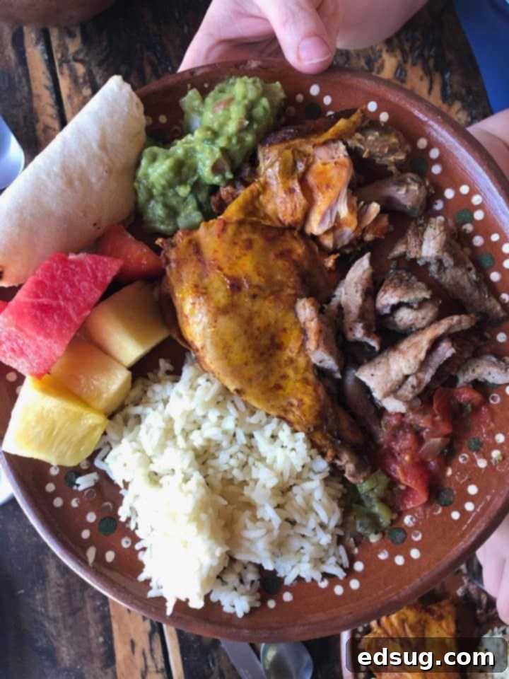 A vibrant lunch plate from Cozumel, featuring a variety of authentic Mexican dishes alongside fresh corn tortillas, inspiring the homemade recipe.